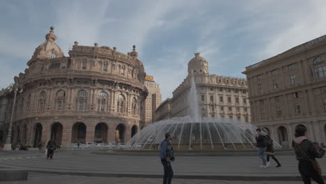 Genoa-Piazza-De-Ferrari-square,-fountain-and-Palazzo-della-Borsa-palace
