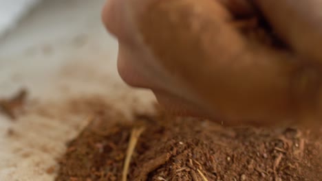 Macro-Shot-Of-Madder-Root-Powder-Production,-Used-For-Red-Textile-Dye-And-Cosmetic-Products