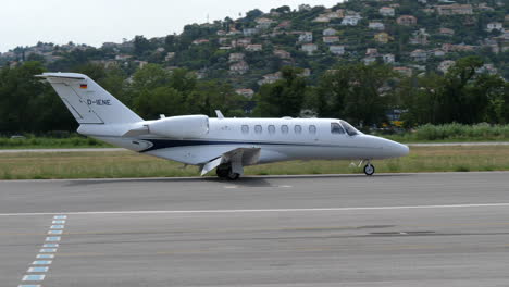 Luxury-private-jet,-taxiing-at-asphalt-taxiway-in-exclusive-Cannes,-France
