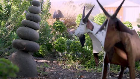 Goats-and-rocks-figure-decorations-in-the-garden