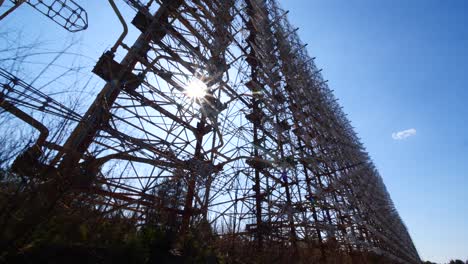 Radar-Duga-lens-flare,-large-metal-military-equipment-structure,-Chernobyl