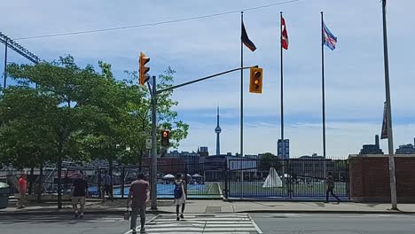 Pedestrians-walk-towards-Indigenous-Vaccine-Clinic-at-the-University-of-Toronto,-Toronto,-June-19,-2021