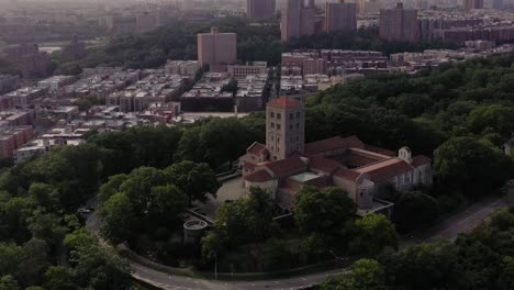 Short-clockwise-aerial-lowering-orbit-of-The-Cloisters-in-Upper-Manhattan-NYC-with-a-subtle-parallax-with-its-hilltop-vista