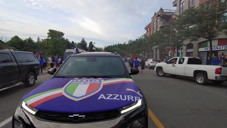 Car-decorated-with-Italian-flag,-people-celebrating-Italy-wins-Euro-cup---Woodbridge