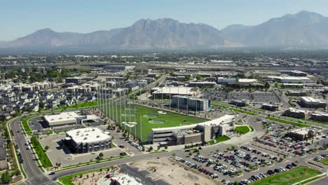Topgolf-Sports-Venue-Utah-Aerial-Pullback-With-Mountains-In-Background