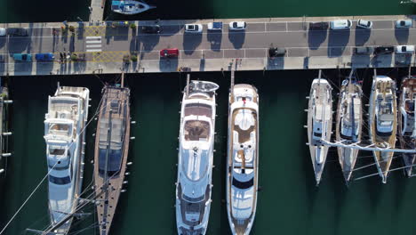 Top-view,-aerial-above-luxury-fleet-of-yachts-and-boats-in-Palma,-Mallorca