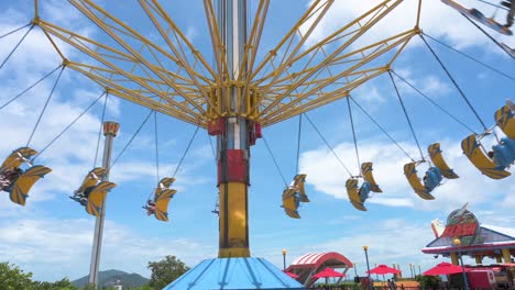 Visitors-enjoy-the-Whirly-Bird-ride-during-their-visit-to-the-amusement-and-animal-theme-park-Ocean-Park-in-Hong-Kong