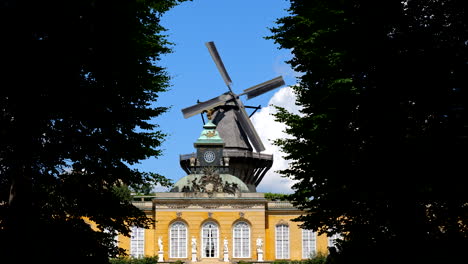 Potsdam,-Germany---Circa-August,-2021:-Historic-Mill-of-Sanssouci-and-New-Chambers-in-Sanssouci-Park