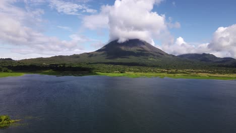 Aerial-video-approaching-famous-Arenal-Volcano-in-Costa-Rica-during-wet-season
