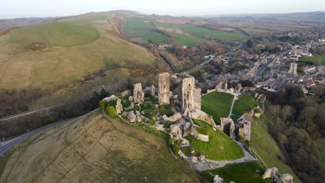 Amazing-view-of-Corfe-Castle-perched-on-hill-during-golden-hour