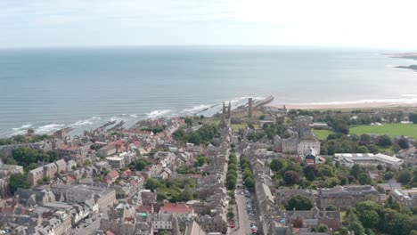 Drone-shot-towards-the-sea-over-St-Andrews-University-town-Scotland