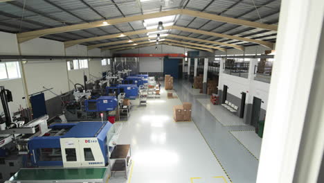 Modern-Machines-With-Conveyors-At-The-Packing-Department-Of-An-Injection-Molding-Company