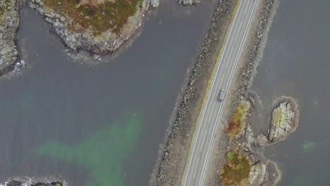 Bird´s-Eye-View-Of-Cars-Driving-On-Storeseisund-Bridge-in-Atlantic-Ocean-Road,-Norway