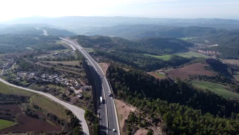 Wide-aerial-panorama-view-of-a-road-in-the-Pyrenees-Mountains-in-Spain