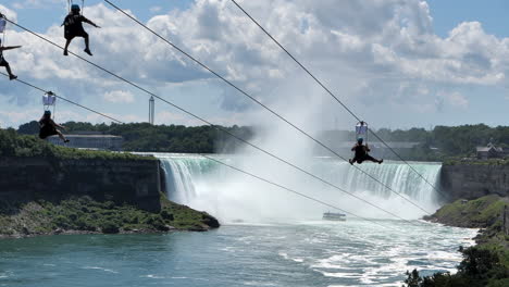 Epic-zip-line-ride-above-the-Niagara-Falls,-slow-motion,-tripod,-adrenaline