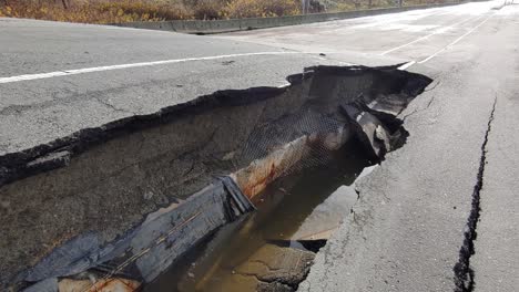 Incredible-hole-in-Highway-11-in-Abbotsford,-BC,-Canada,-ripped-open-few-days-after-major-floods-in-decades