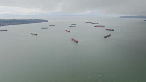 aerial-footage-of-cargo-ship-backlog-in-the-pacific-ocean,-Vancouver,-British-Columbia,-Canada