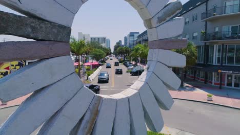 4K-Drone-Video-of-The-Sun-on-the-Edge-Monument-in-Roundabout-in-Downtown-St