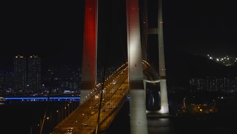 cars-driving-through-over-the-bridge-at-night