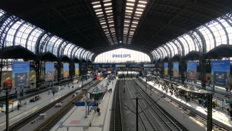 Camera-tilts-up-from-railway-tracks-to-reveal-Hamburg-Central-train-station