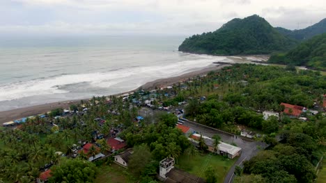 Suwuk-beach-in-Kebumen,-Indonesia.-Aerial-forward