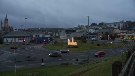 Vehicles-navigate-their-way-around-Cornwalls-famous-Trafalgar-Roundabout-on-a-dreary-day-in-the-UK