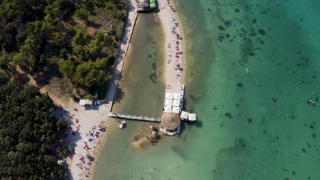 Croatian-Beach-On-The-Town-Of-Novalja---aerial-top-down