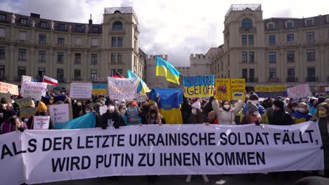 People-express-support-for-Ukraine-at-anti-war-demo-in-Munich-after-Russia-invades-Ukraine