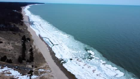 Parallax-4K-drone-video-of-a-beach-with-frozen-shoreline