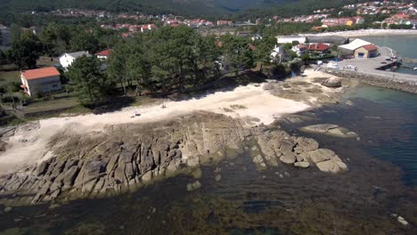 Aerial-View-Of-Esteiro-Beach-Rocks-And-Town