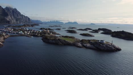 Flying-at-the-coast-of-Henningsvaer-overlooking-the-many-connected-islands-of-Henningsvaer-and-the-football-field-on-one-of-the-islands