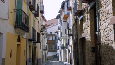 View-of-a-narrow-street-featuring-the-beautiful-historic-fort-town-of-Morella,-Spain