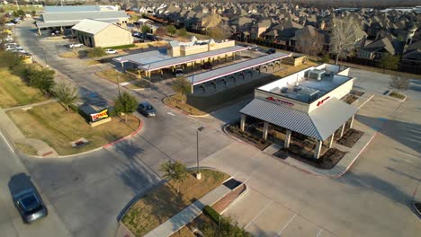 Aerial-footage-of-Pizza-Hut-and-Sonic-restaurants-in-Lantana-Texas