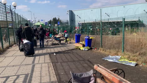 Emergency-blankets-and-other-trash-left-behind-as-Ukrainian-refugees-line-up-at-the-Polish-border