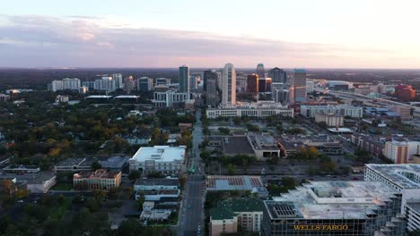 4K-Aerial-parallax-clip-at-twilight-of-downtown-Orlando,-Florida