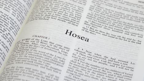 Close-Up-Shot-of-Bible-Page-Turning-to-the-book-of-Hosea