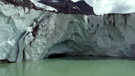 big-italian-glacier-above-the-glacial-lake,-aerial-left-to-right-close-up-shot