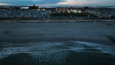 An-aerial-view-of-a-beach-in-Arverne,-NY-in-the-evening