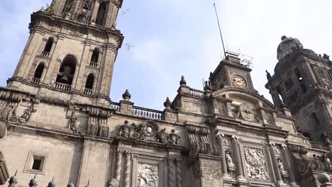 Stone-Church-at-Mexico-DF-plaza,-Tilt-down