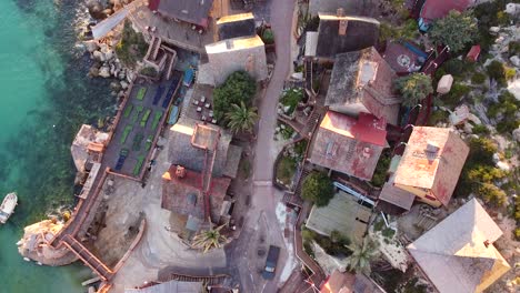 Narrow-streets-of-local-wooden-fisherman-village,-aerial-top-down-view