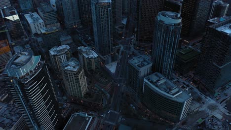 Overhead-aerial-of-Seattle's-downtown-skyscrapers-in-the-early-morning