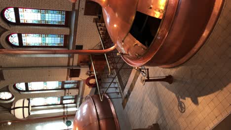 Brewing-vats-in-original-Heineken-brewery-in-Amsterdam,-Netherlands