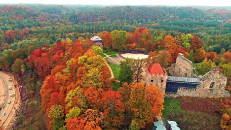 Neo-Gothic-style-Sigulda-Castle-surrounded-by-fall-coloured-foliage