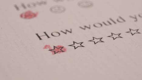 Filling-Out-One-Star-With-Red-Colored-Pencil-In-An-Evaluation-Sheet