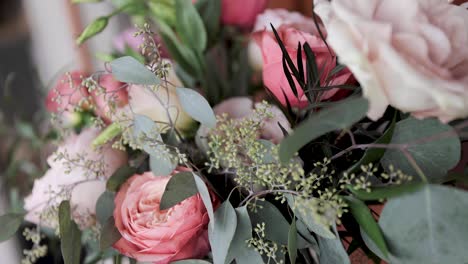 Close-Up-Wedding-Flower-Bouquet-of-Pink-Florals-and-Greenery-Outdoors-1080p-60fps