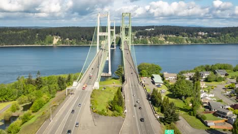 Clouds-boil-above-the-Tacoma-Narrows-Bridge,-Puget-Sound,-aerial-hyperlapse-dolly-zoom