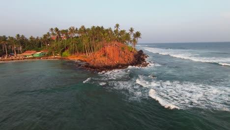 Aerial-FPV-drone-shot-of-Palm-tree-island-just-near-to-the-sea