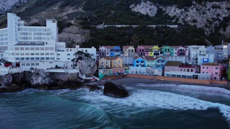Panorama-Of-Caleta-Hotel-And-Colorful-Buildings-At-Catalan-Bay-In-The-British-Overseas-Territory-Of-Gibraltar