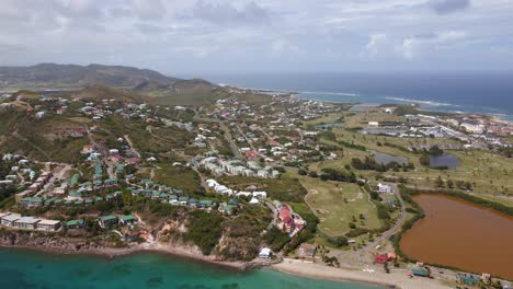 Aerial-view-of-the-city-of-Basseterre,-in-sunny-St-Kitts-and-Nevis---panoramic,-drone-shot