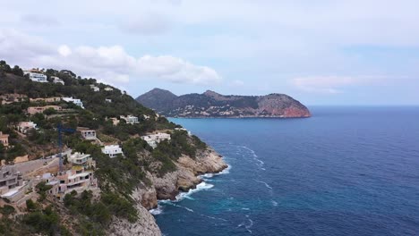 A-cliff-of-Mallorca-in-which-small-houses-were-built